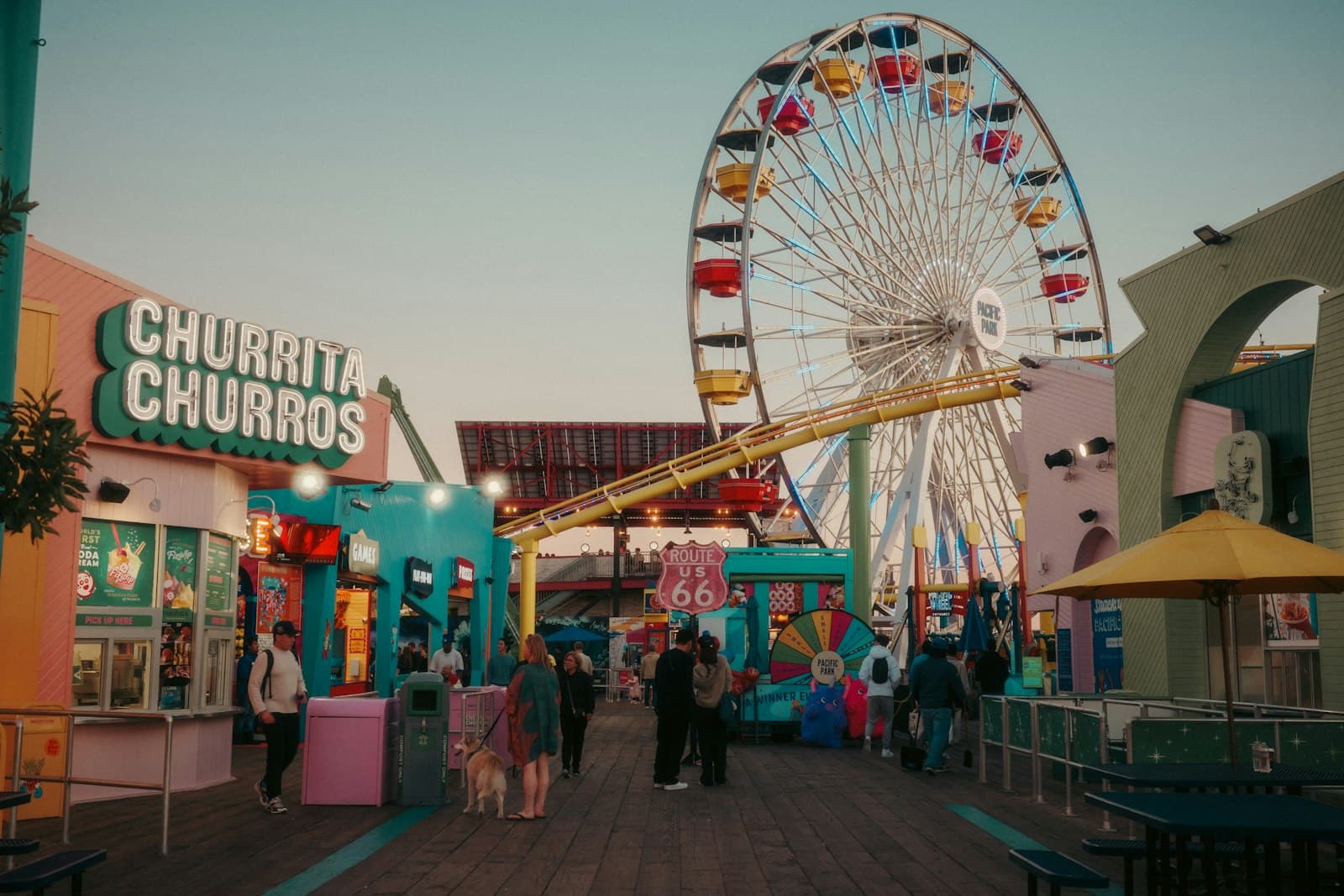 Pier boardwalk shops, food stalls, and amusement rides