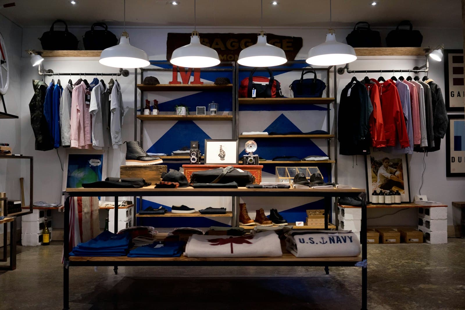 Interior of a small clothing boutique with central display table