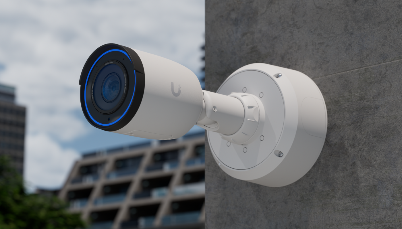 Protect camera mounted on a building corner, aimed as the coverage drawing specified